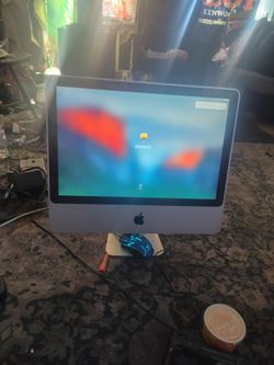 Apple iMac desktop + keyboard