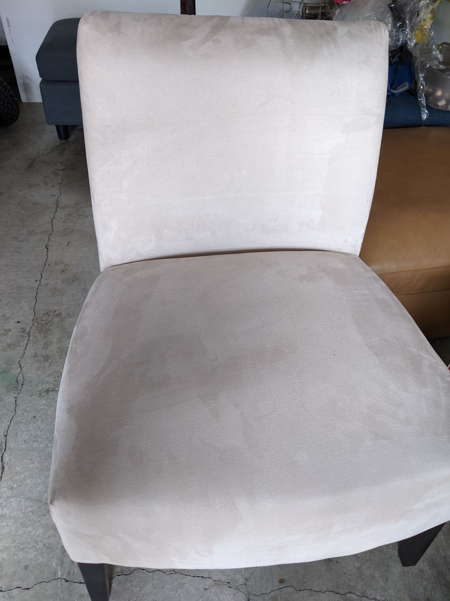 2 accent chairs in good clean condition with an ottoman. The ottoman (it has storage space)has some light scratches as seen in the pictures.