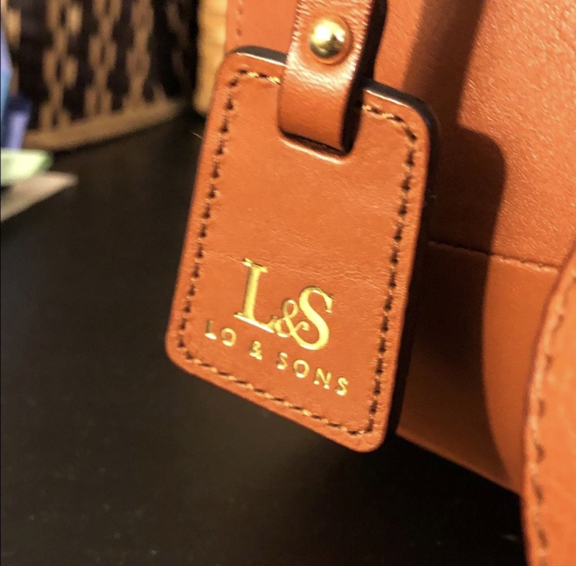 Lo & Sons Claremont camera bag in sienna full-grain leather.