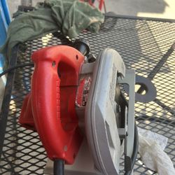 The product in the image is a Milwaukee TILT-LOK 7-1/4" Circular Saw, model 6390-21.