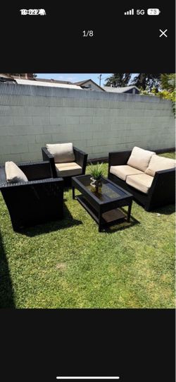 4 piece modern zen…wicker out door furniture..button cushions ripped $100