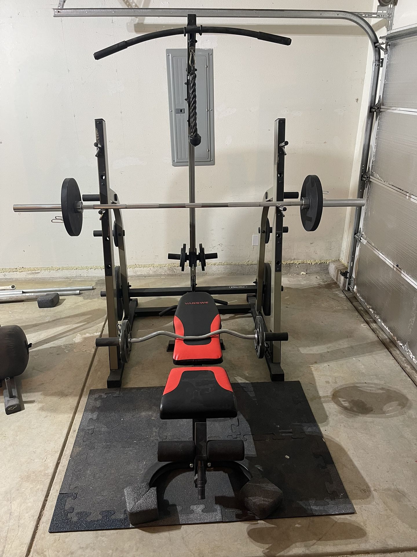 Squat Rack, Bench Bar And Weights 