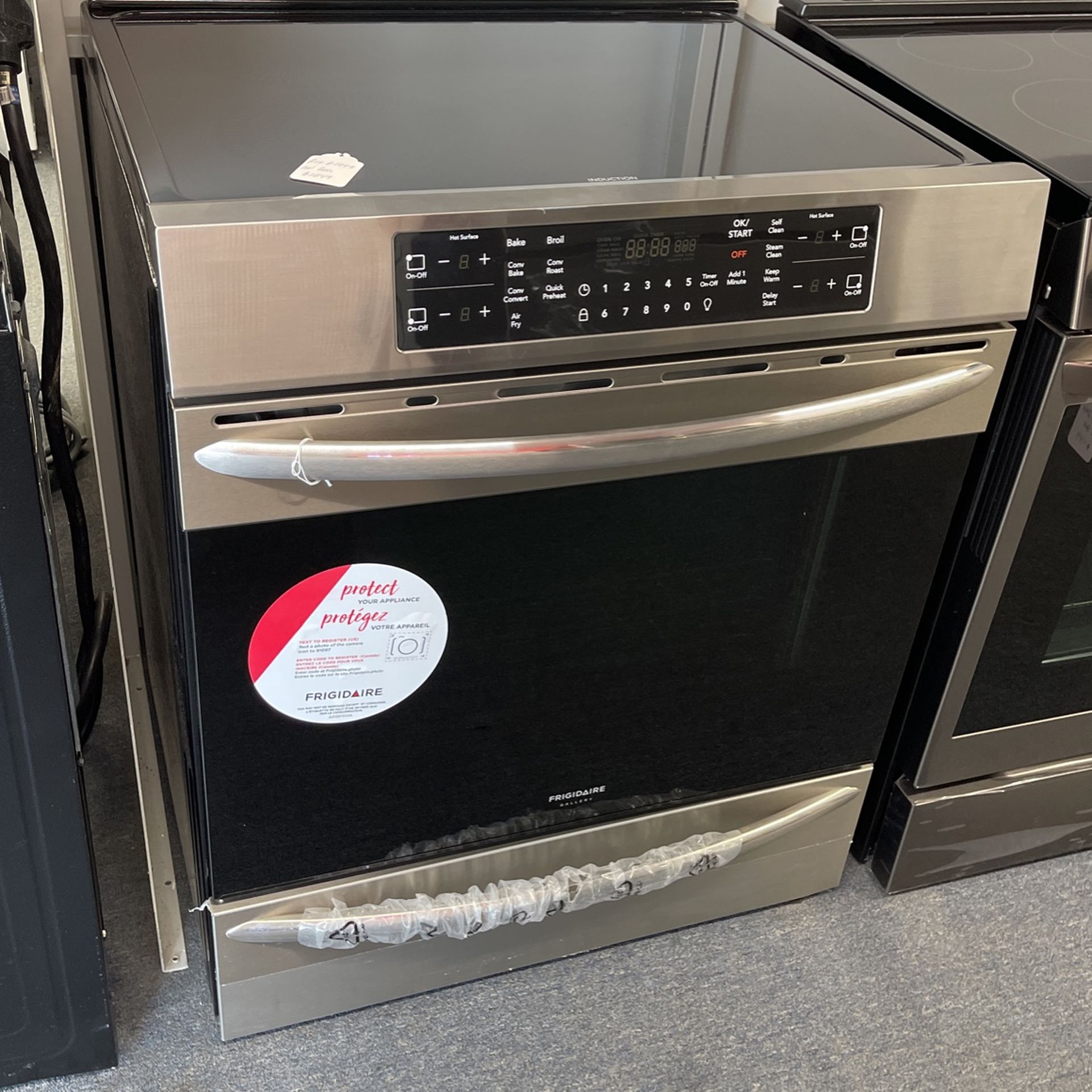 New Scratch And Dent Frigidaire Gallery 4 Burner Glass Too Induction Slide In Stainless Steel Range. 1 Year Warranty