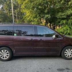 2009 Burgundy Honda Odyssey with Hand Controls for the Disabled