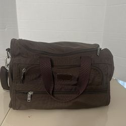 TUMI Brown Carry On Messenger Bag With Shoulder Strap USA Excellent Condition. The bag has been very gently used and in very good condition. It’s choc