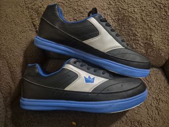 Brand New Brunswick Renegade Men's Bowling Shoes (Size 11)Condition: Brand New (Never Worn)Size: Men's 11 (US)Color: Black / Royal Blue / Silver
