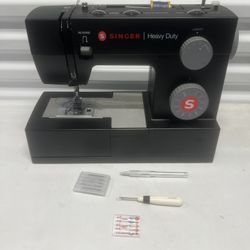 Singer Heavy Duty 4432 Sewing Machine Works Great  Condition. No Cord or foot pedal. Tested works however the power supply was shipped with a differen