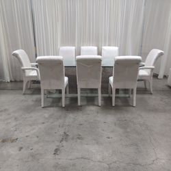 Glass Top Stone Base Dining Table with Eight Upholstered Chairs