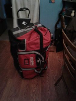 HUGE ZIPPER. BAG ON WHEELS