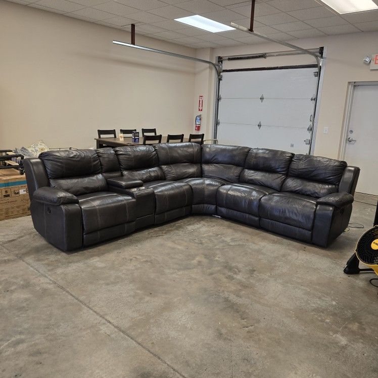 Dunhill Leather Power Reclining Sectional. Charcoal Gray $1,300 + tax