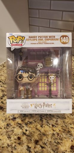 HARRY POTTER WITH EEYLOPS OWL EMPORIUM FUNKO POP-$50