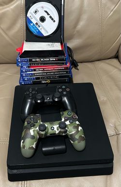 PS4 Slim 500GB with 2 Controllers and Charging Dock – Excellent Condition