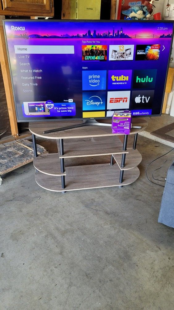 55" Samsung Smart Tv With New Tv Stand Firm Price 