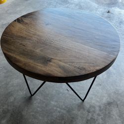 Round teak wood end table with hairpin iron legs