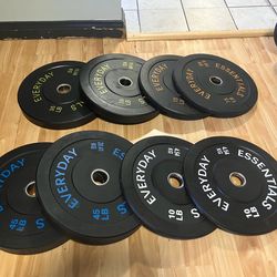 NEW IN THE BOX bumper plates weights 260lbs w/ NEW 7ft Bar