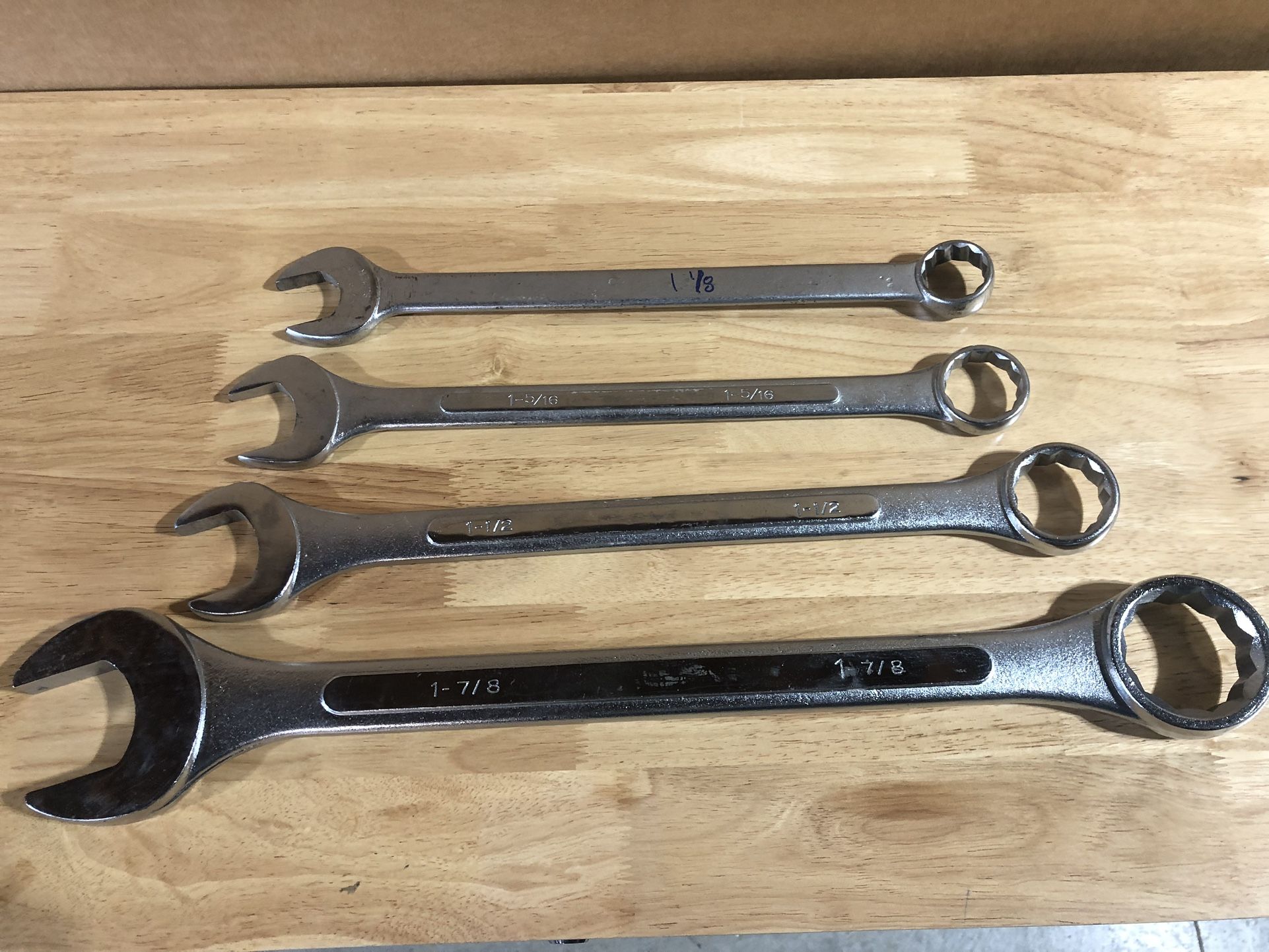 Four Large Wrenches