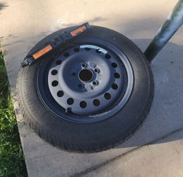 Nissan Jack & New Tire