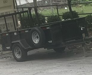 Black Utility Trailer with Pipe Top Rail