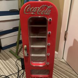Small Refrigerator for Cola Cans. 