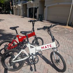 
🚲 For Sale: MATE Electric Bikes – Red & White – Foldable, Like New! 🚲