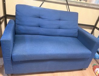 Blue twin pull out couch
