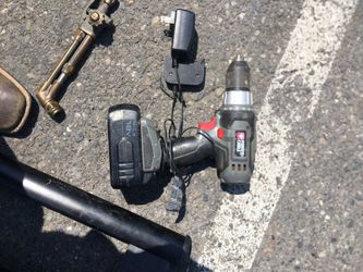 Drill with battery and charger