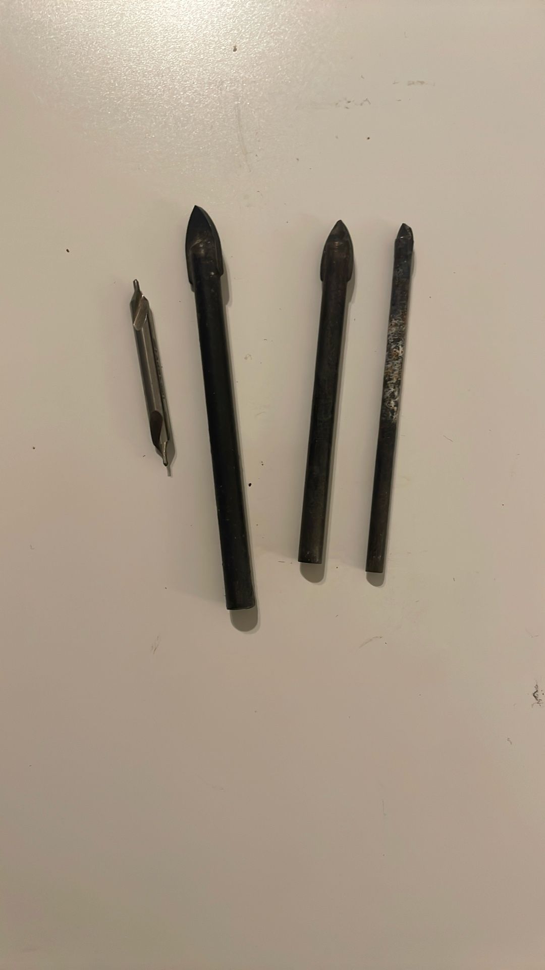 center drill bit And several glass/tile bits