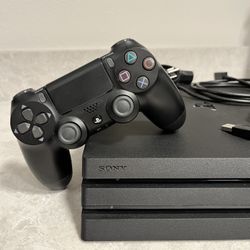 PS4 Pro 1TB - Works Great + Controller & Cables
