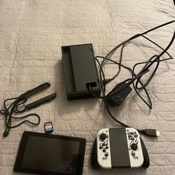 Nintendo Switch Like New!! W / Controllers ,Sim Card, & More