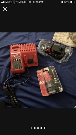 Milwaukee Battery charger + Battery