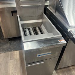 Standard Range Commercial Gas Fryer Restaurant Grade. Stainless steel floor fryer with open fry pot, tube burners, and grease drawer. Solid heavy-duty