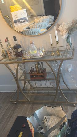 Bar cart/ glassware / and Gold mirror
