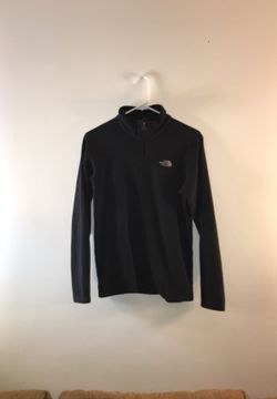 The North Face pull over jacket. Mid zip sweater