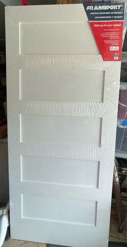 Solid wood white paneled door