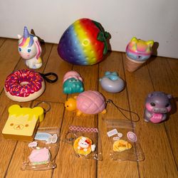 Lot of squishes - large strawberry, unicorn, keychains & more