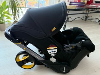 Doona + Car Seat & Stroller WITH base — nitro black