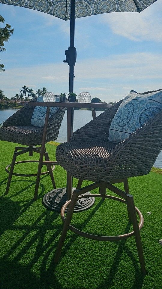 Bistro table and chairs & Umbrella