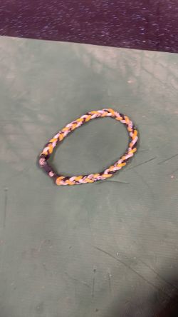 A black yellow and white necklace