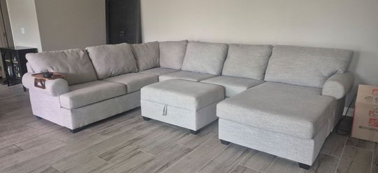 Light Gray Living Spaces Sectional Couch