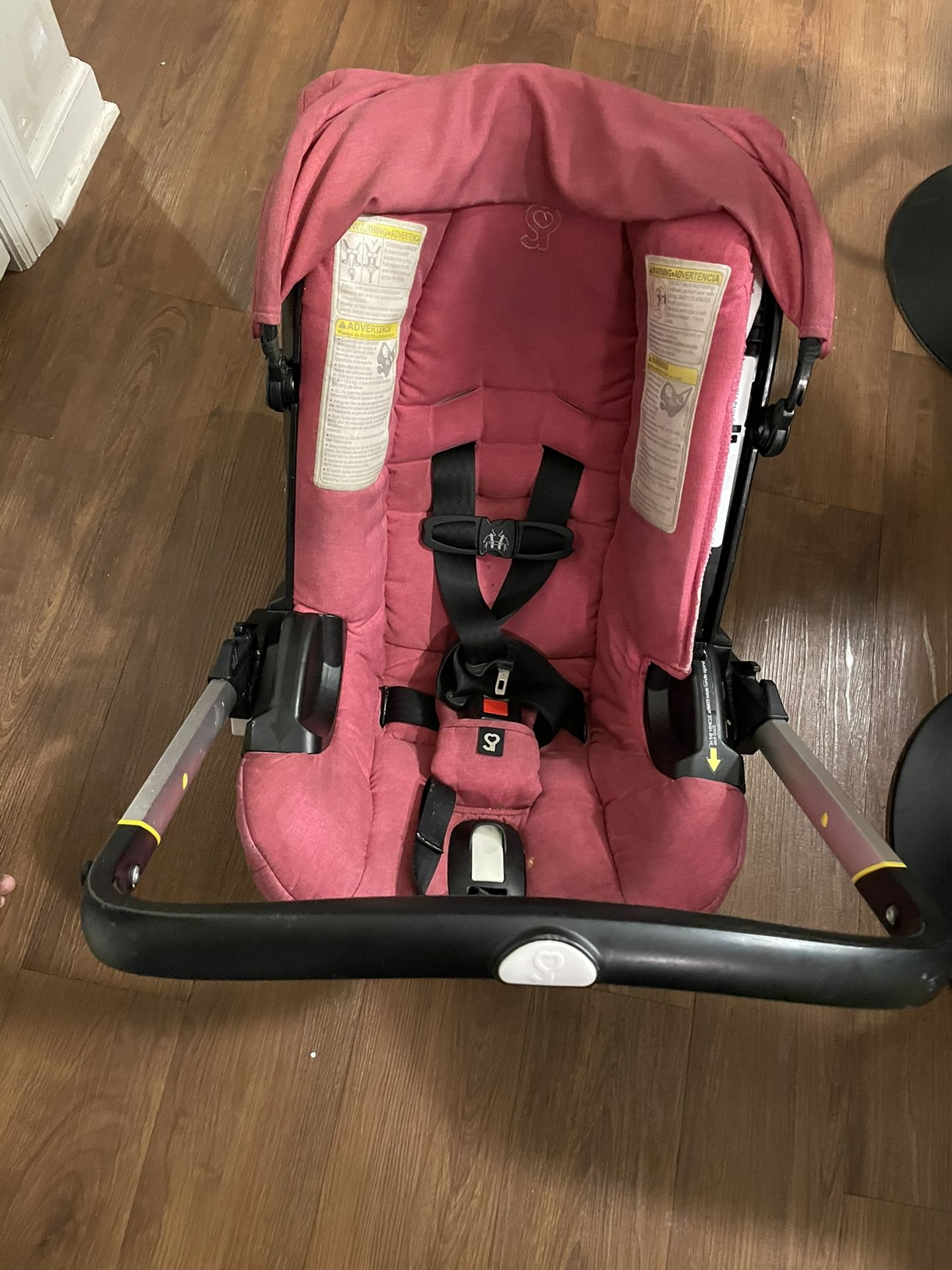 Doona Infant Car Seat Baby Stroller , All In One Folds down into a Car Seat Base Included
