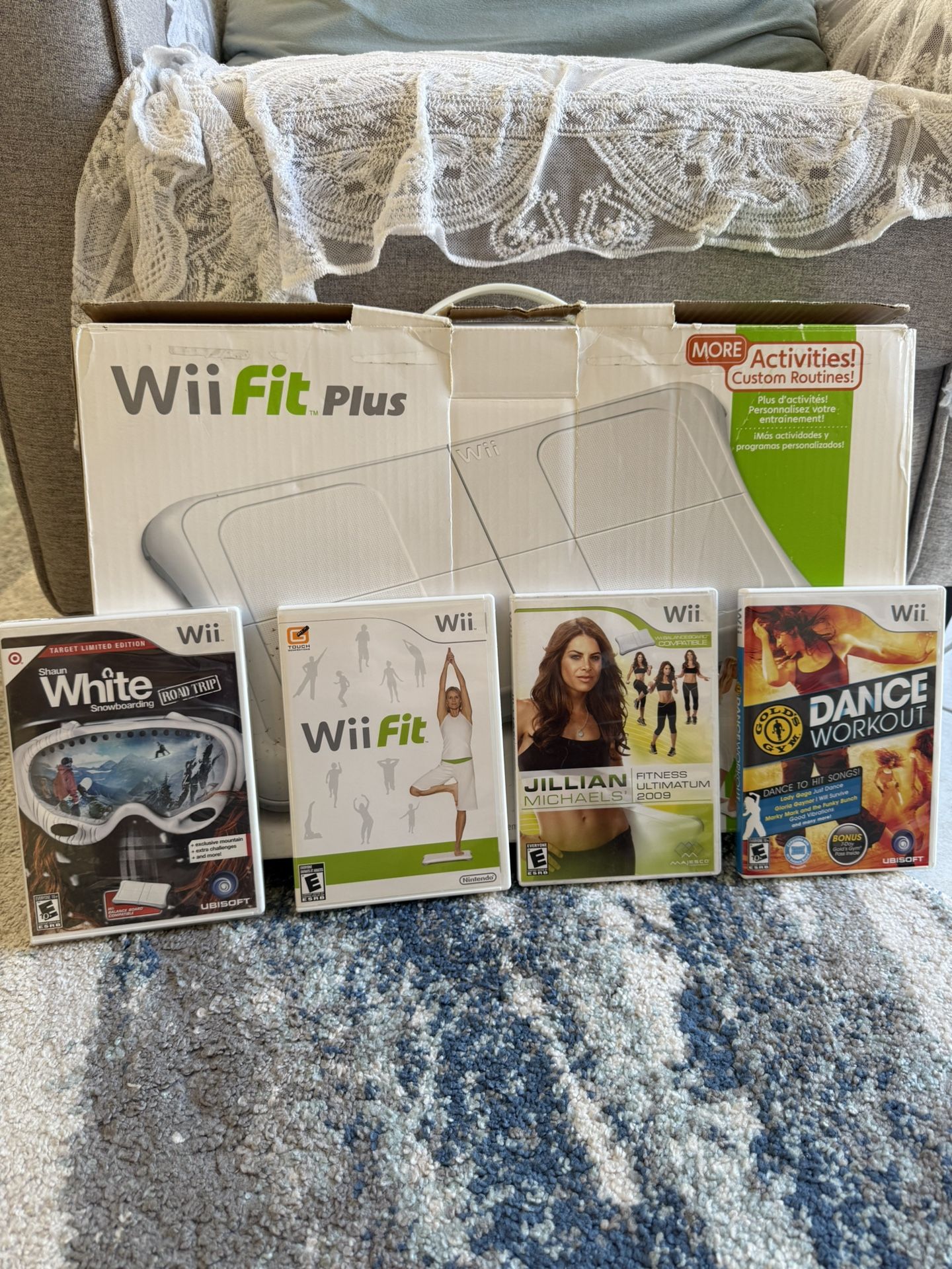 Nintendo Wii Fit Plus Bundle. Wii Balance Board + 4 Games