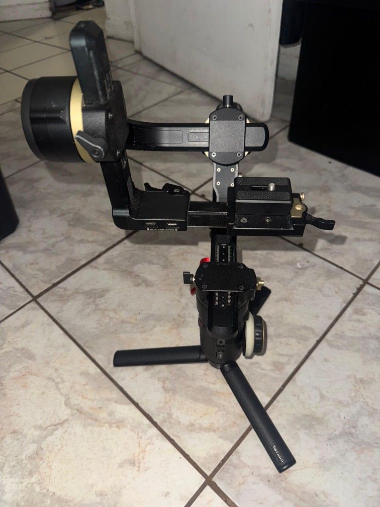 Sony A6100 Camera Bundle
This Camera is ready for video or photography needs
1. Sony Camera Body
2. Battery Grip
3. 4 Camera Batteries
4. Godox S