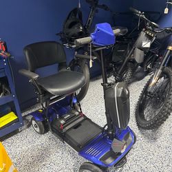 Ew-26 , 4 Wheel 24V 250W aluminum Foldable Mobility Lithium battery Electric Scooter