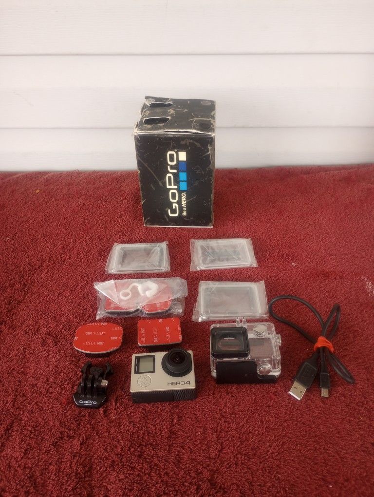 GoPro Hero 4 Digital Camera Camcorder Silver with accessories 
