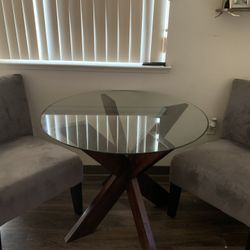 Glass Table  And Two Grey Chairs