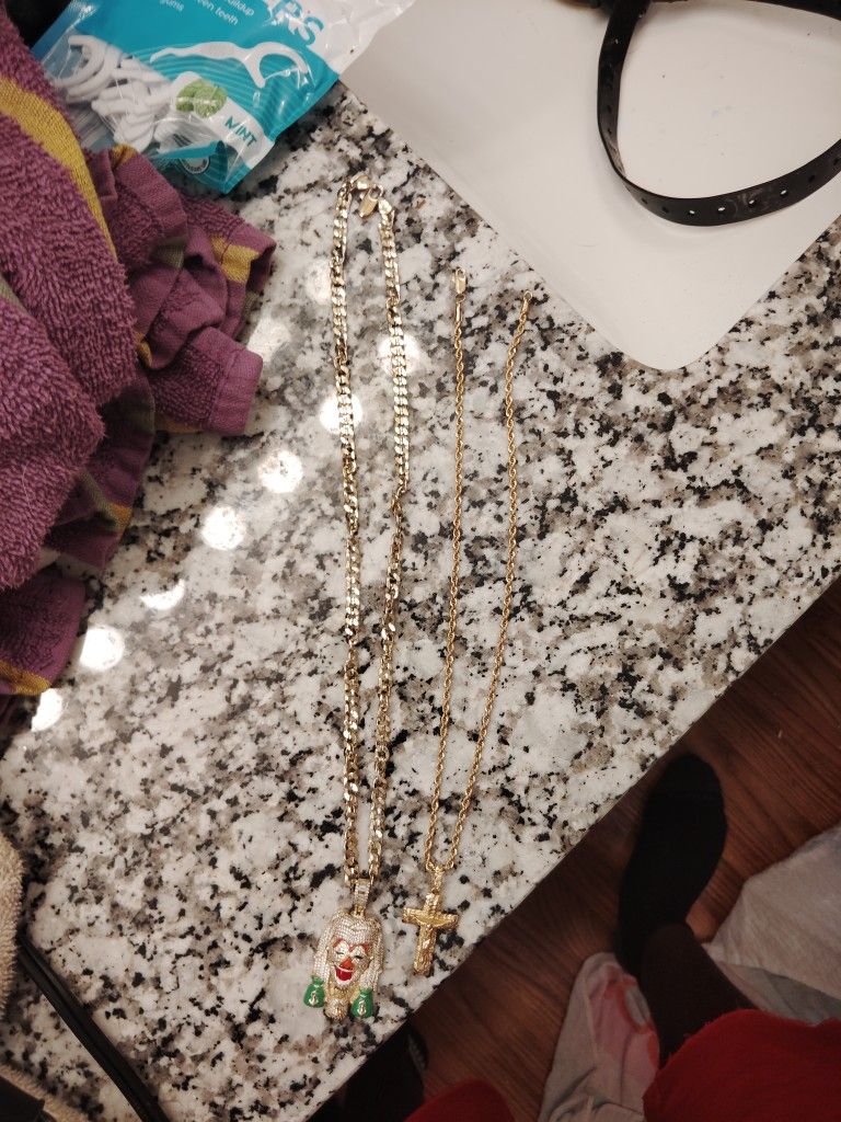 10k Gold Rope Chain And 15k Steal Gold Chain .With Diamonds In The Pendent