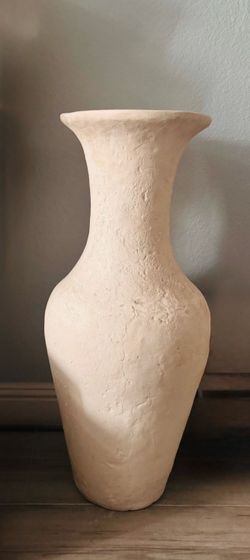 32” amphora-style floor vase features a textured, rustic cream finish