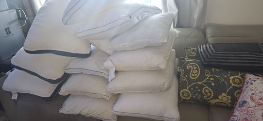 I have a variety of used pillows—clean and in good condition—in King and Queen sizes; there are over 35 or 40 of them. If you're interested in taking