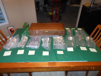 88-Piece Silver-plated Flatware Set, service sets for 16, plus 7 serving pieces, and wooden chest.
