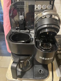 Keurig pod and grounds coffee machine with pod holder